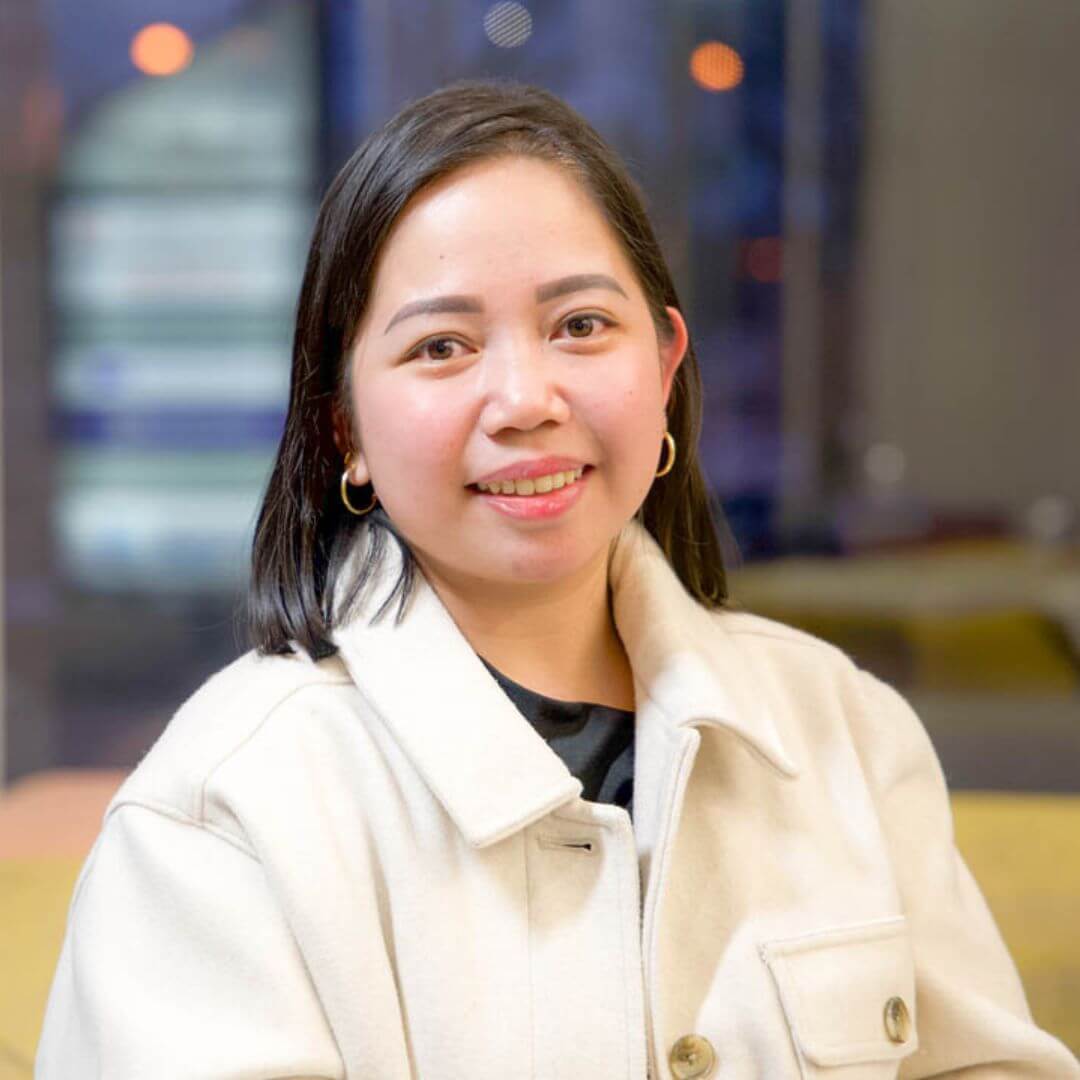 A portrait Ella Torres smiling for the camera