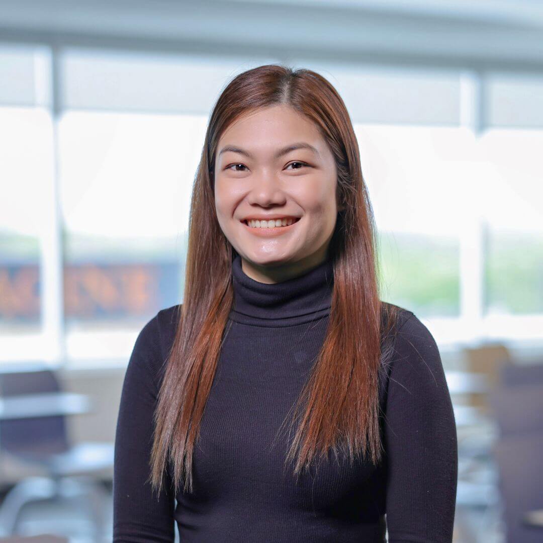 A portrait Krysia Tamaray smiling for the camera