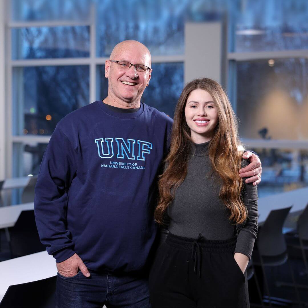 A portrait Paulo and Barbara Starick smiling for the camera