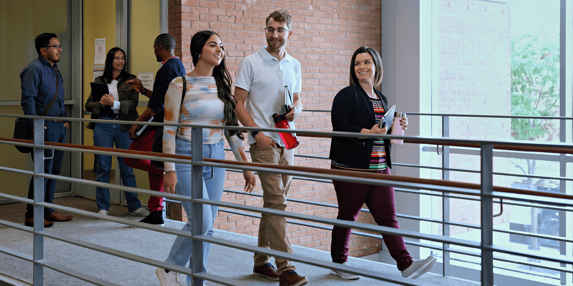 Students walking and talking at the UNF corridor